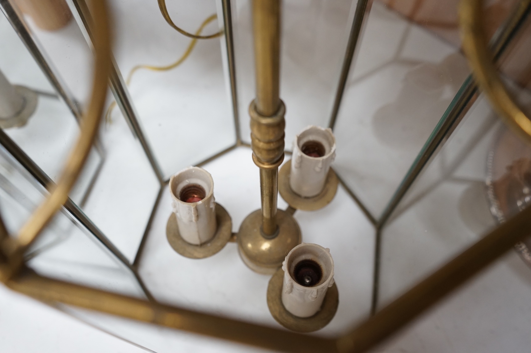 A pair of French octagonal glass and brass lanterns, 40cm